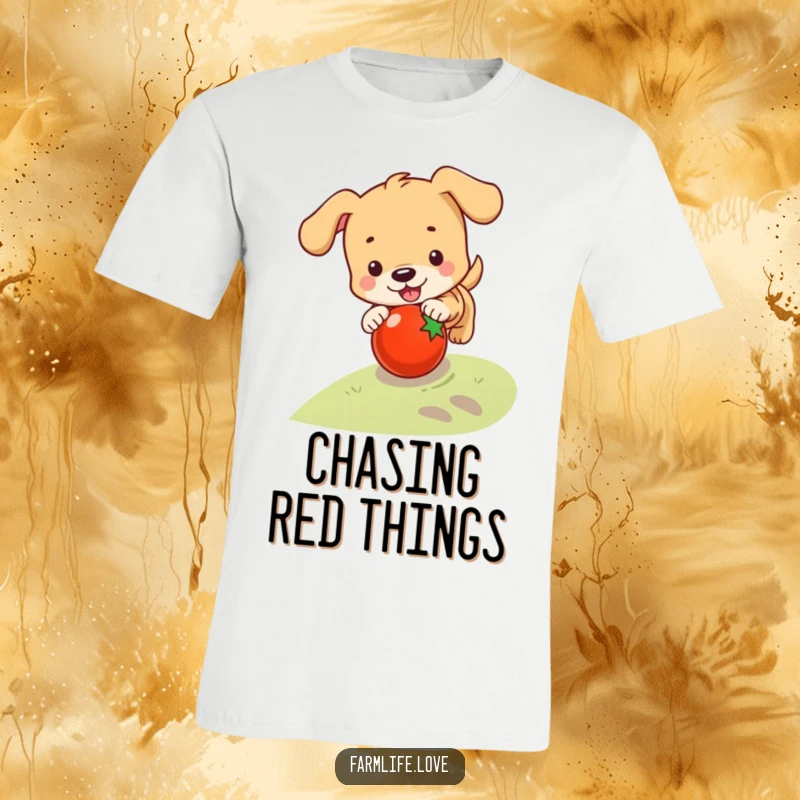 Funny t-shirt showing a playful puppy actively chasing a rolling tomato down a gentle slope, full of puppy energy.